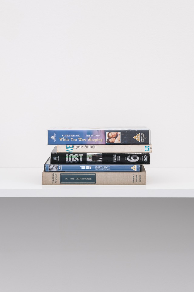 Christian Andersson
*While you were sleeping We Lost The Key To The Lighthouse*, 2009
hardcover book, dvd cases, paperback, vhs case
102 x 42 x 25 cm