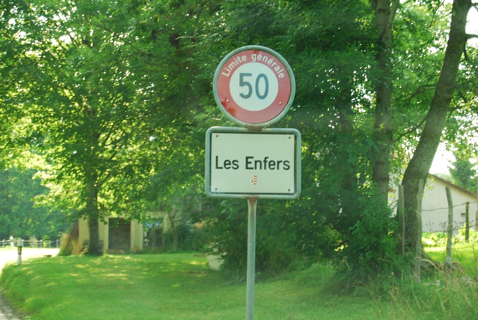 The entry sign to the village 'Les Enfers' (translated: the underworld) in Jura, Switzerland