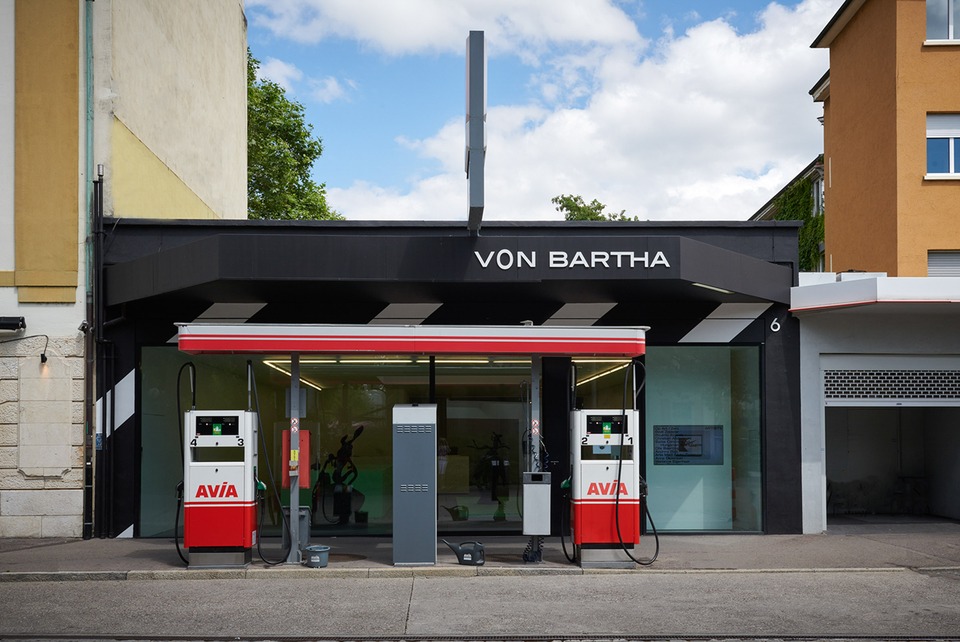 After: Main entrance of the gallery with working gas pumps of front