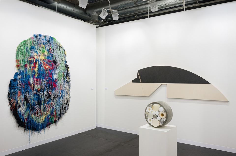 Installation view of Art Basel 2024\
with works by (f.l.t.r.) Caroline Achaintre, Ted Stamm and Anna Dickinson