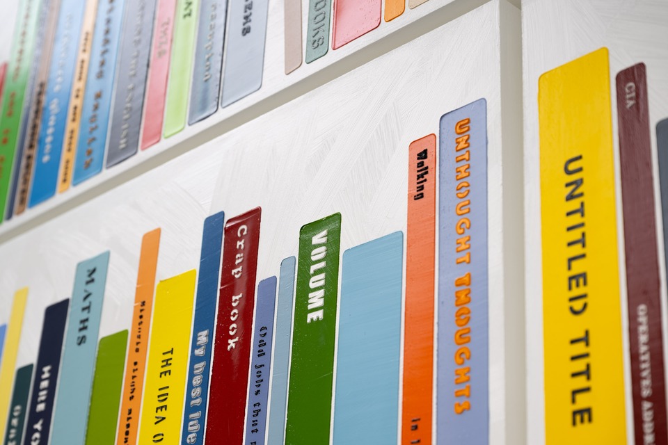 Detail of John Wood & Paul Harrison’s “Some Painted Books,” 2025

Oil on 24 plywood panels

216 x 400 cm
